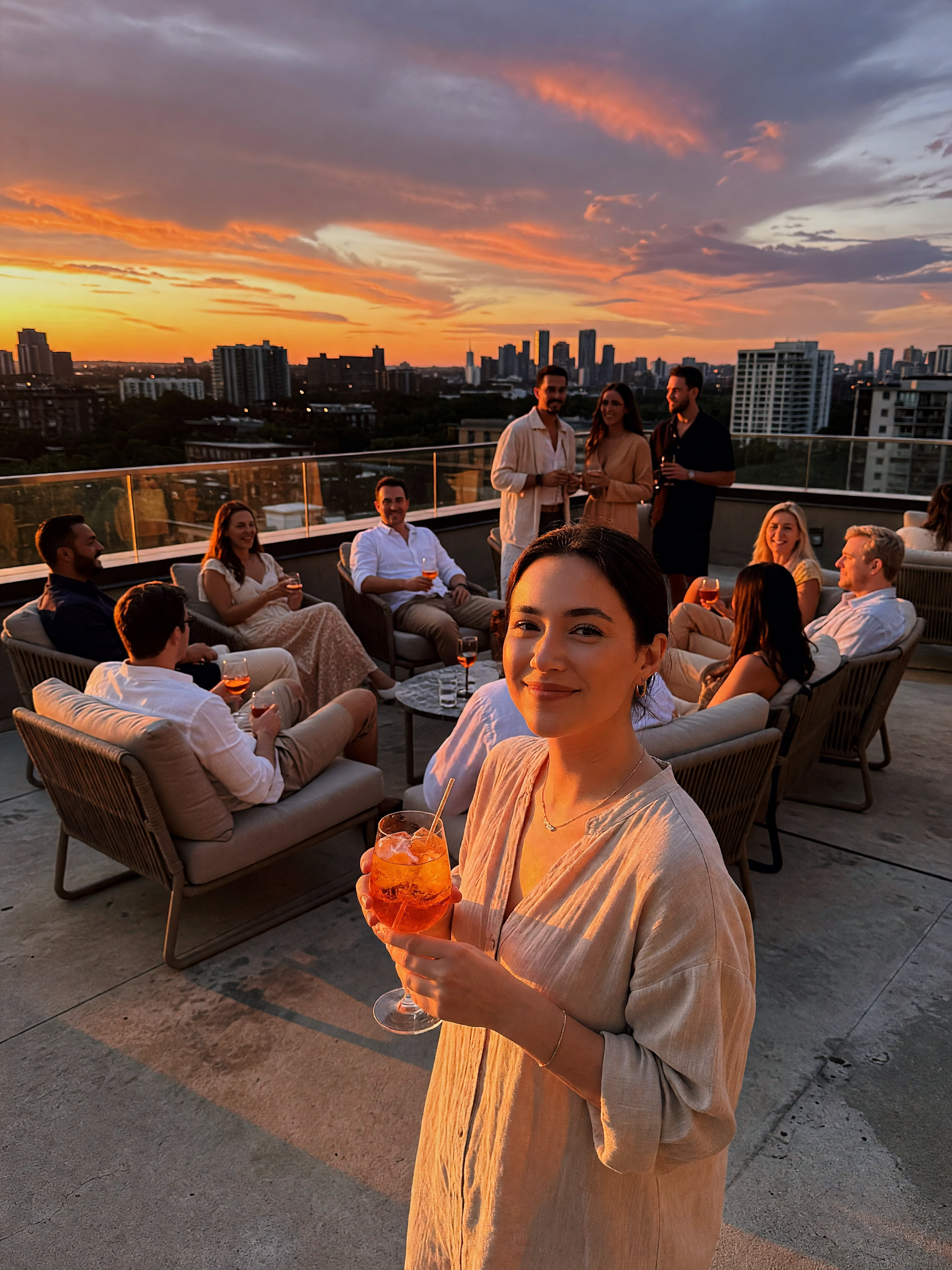 skyline glowing, one cocktail and three friends who always make me laugh. the ci