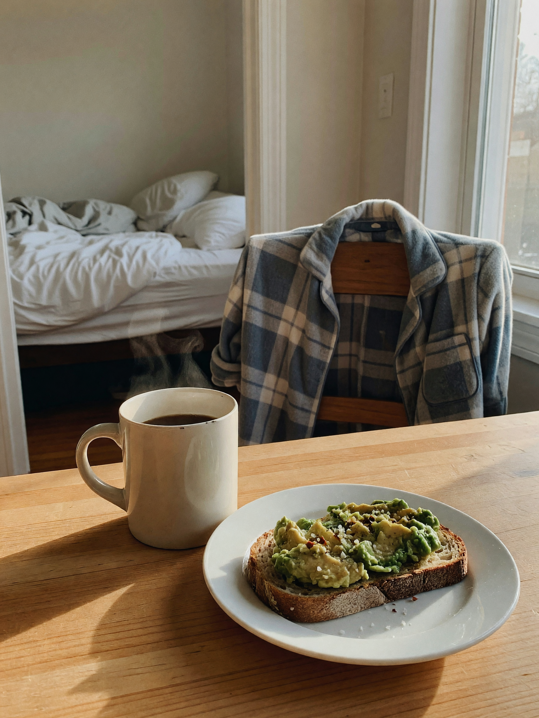 slow mornings and coffee before the day starts. toast with avocado and some suns