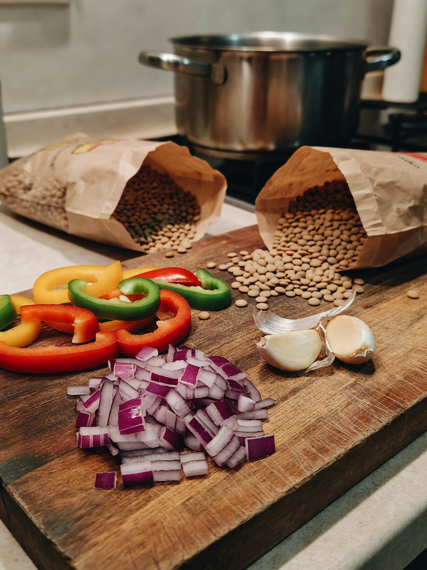 chopped the onions, garlic and bell peppers, now waiting on the lentils to softe