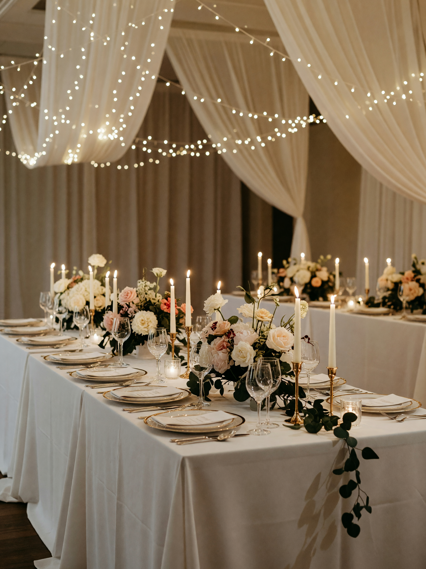 table settings all set, white linens and candles, aisle runner going down. had to dress up for this 