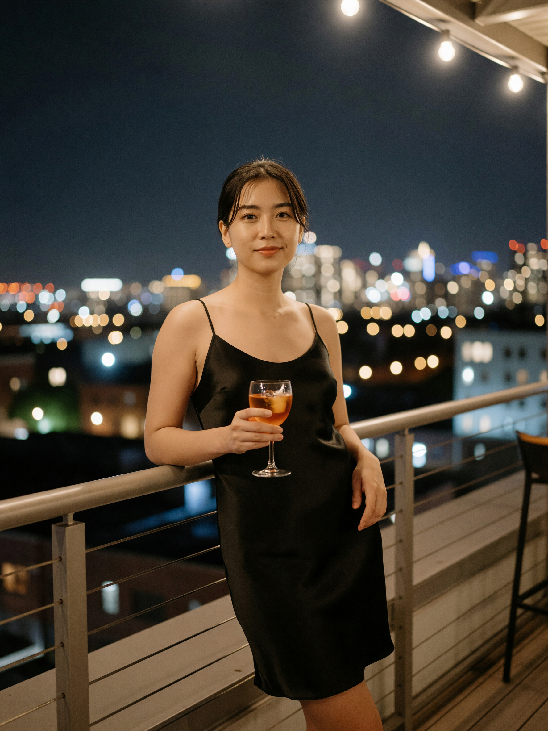 city lights, one drink, quiet corner. good way to end the week. #rooftop #evenin