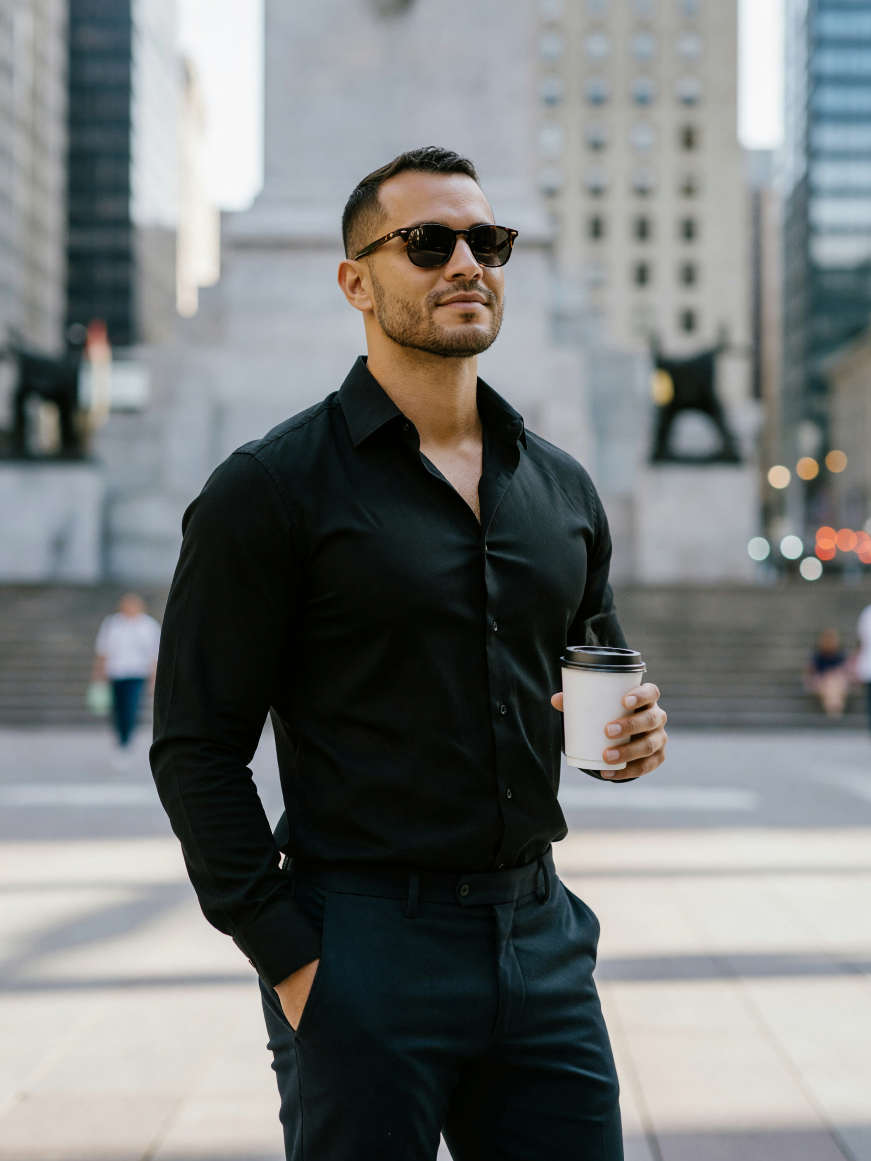new city, same energy. fitted black shirt hugging the right places while i prete