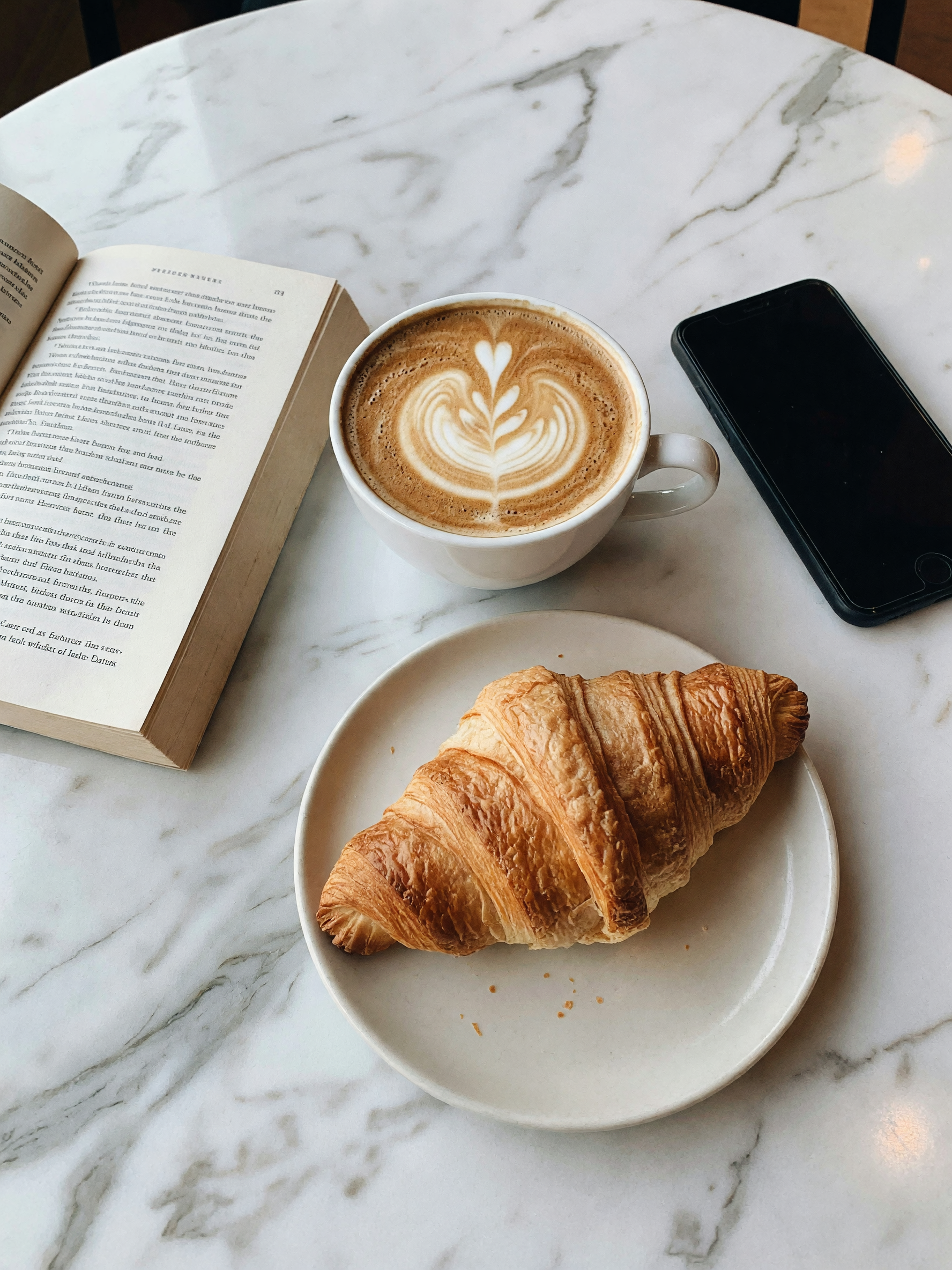 cafe corner solo session , latte art came out nice today and the croissant is still warm ☕