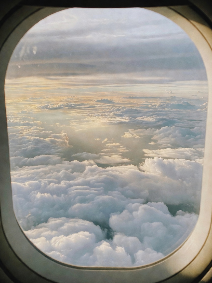 always forget how peaceful it feels above the clouds. finished my book and now j