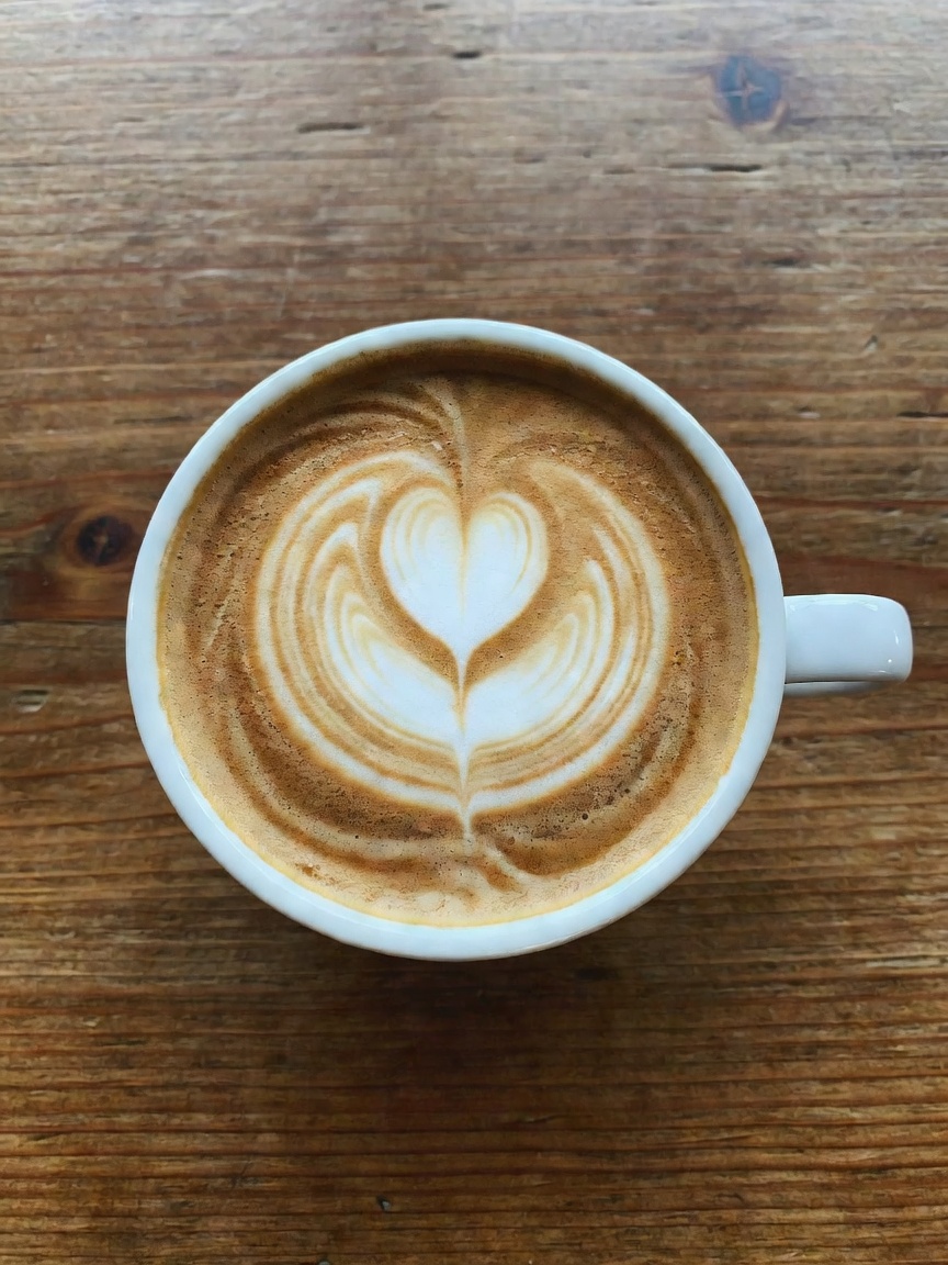 fueling up before a big training day. this flat white art is too pretty to drink