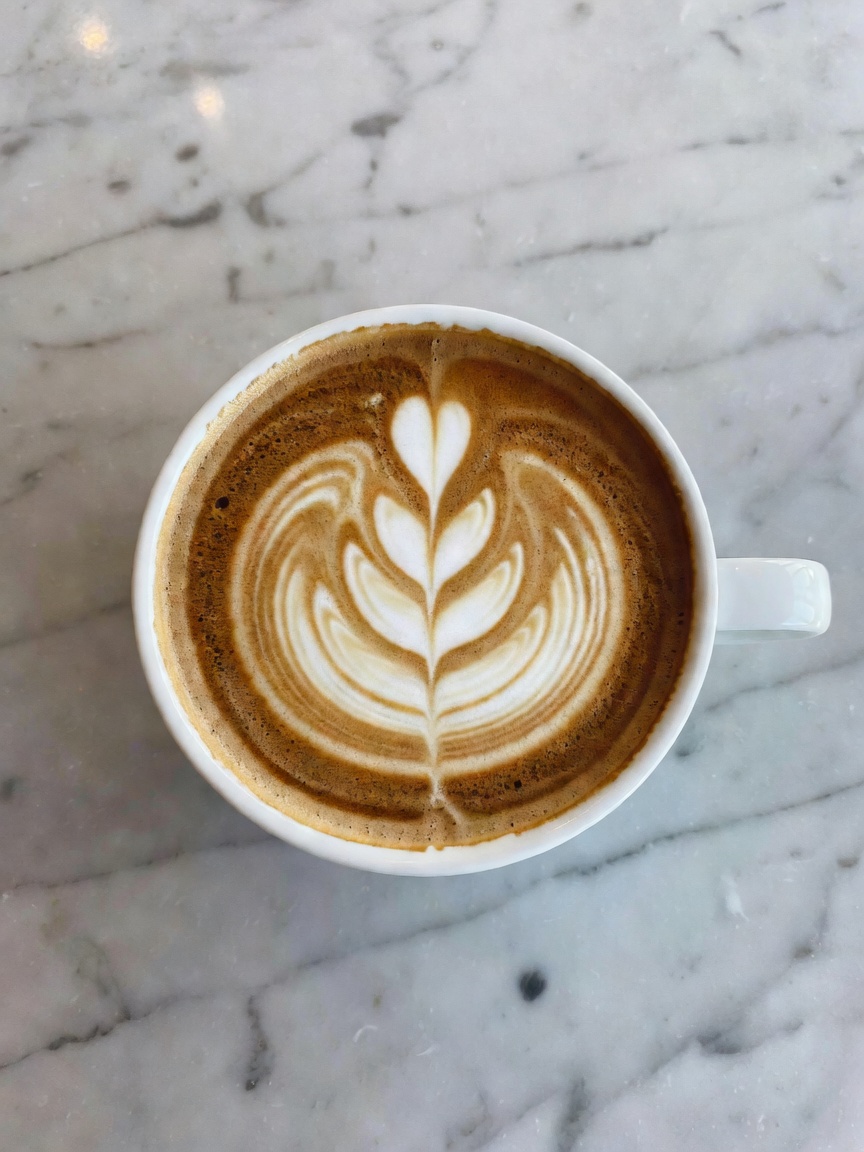 fueling the next content ideas with this perfect flat white and a flaky croissan