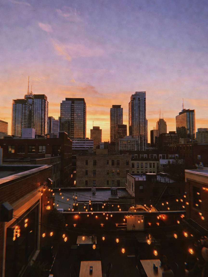 Sunset drinks with the girls never get old. City lights starting to twinkle and 