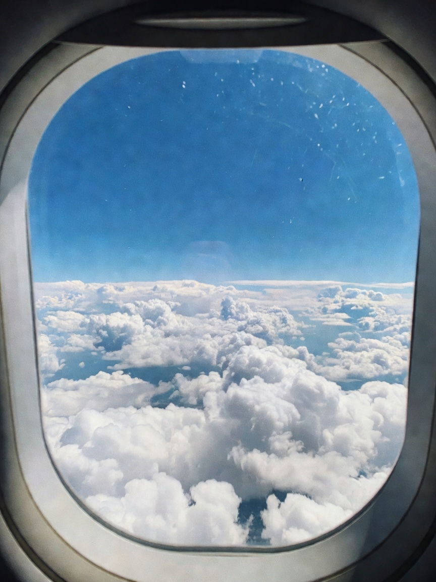 another flight another city. always moving. the clouds looking extra dramatic to