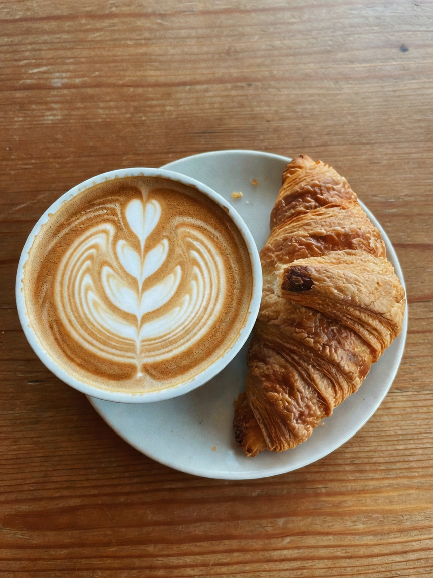 standard saturday setup. decent latte art and a book that might actually get fin